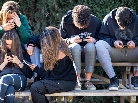Group of boys with mobile phones