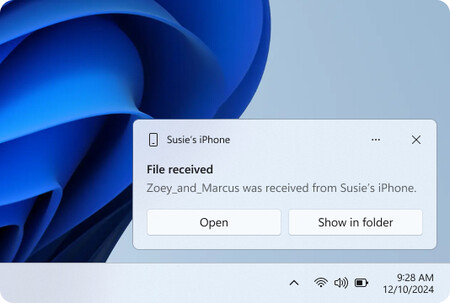 Notificación que aparecerá en el PC cuando vayamos a enviar un archivo desde el iPhone | Imagen: Microsoft