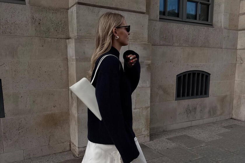 Pantalones con falda: la tendencia layering del otoño-invierno. Así se lleva con pantalones anchos, vaqueros o de traje