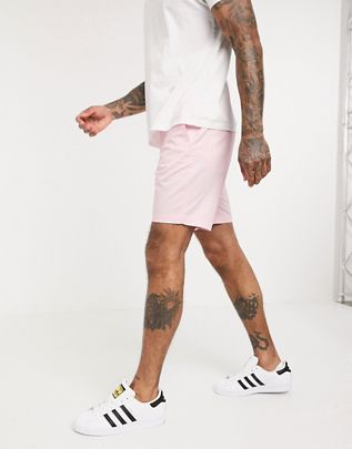 Pantalones chinos cortos de 8 pulgadas con diseño elástico slim en rosa de Original Penguin