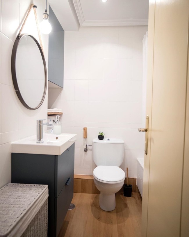 El Antes y después de un cuarto de baño (con lavadora), después de una