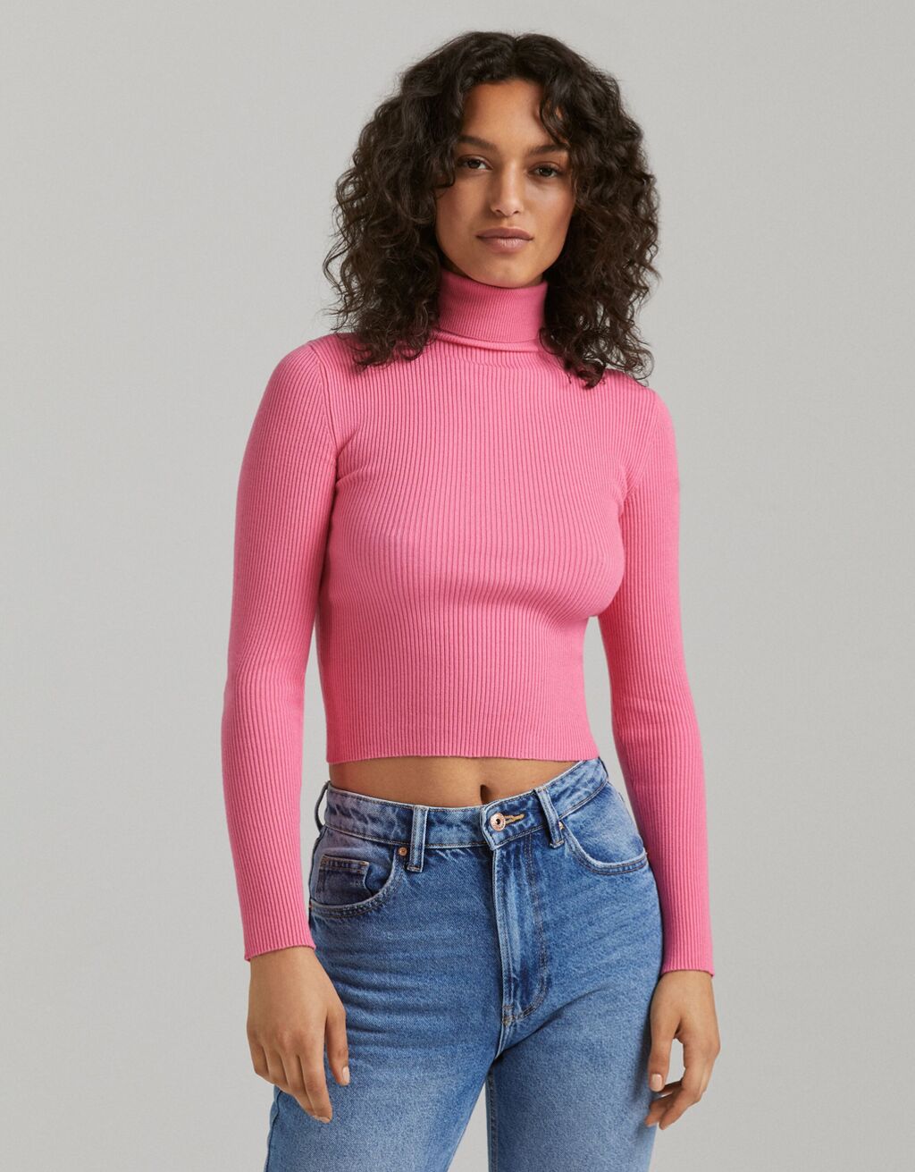 Ribbed high neck jumper with elbow opening