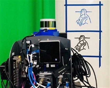 Este robot es capaz de imitar la escritura de cualquier persona