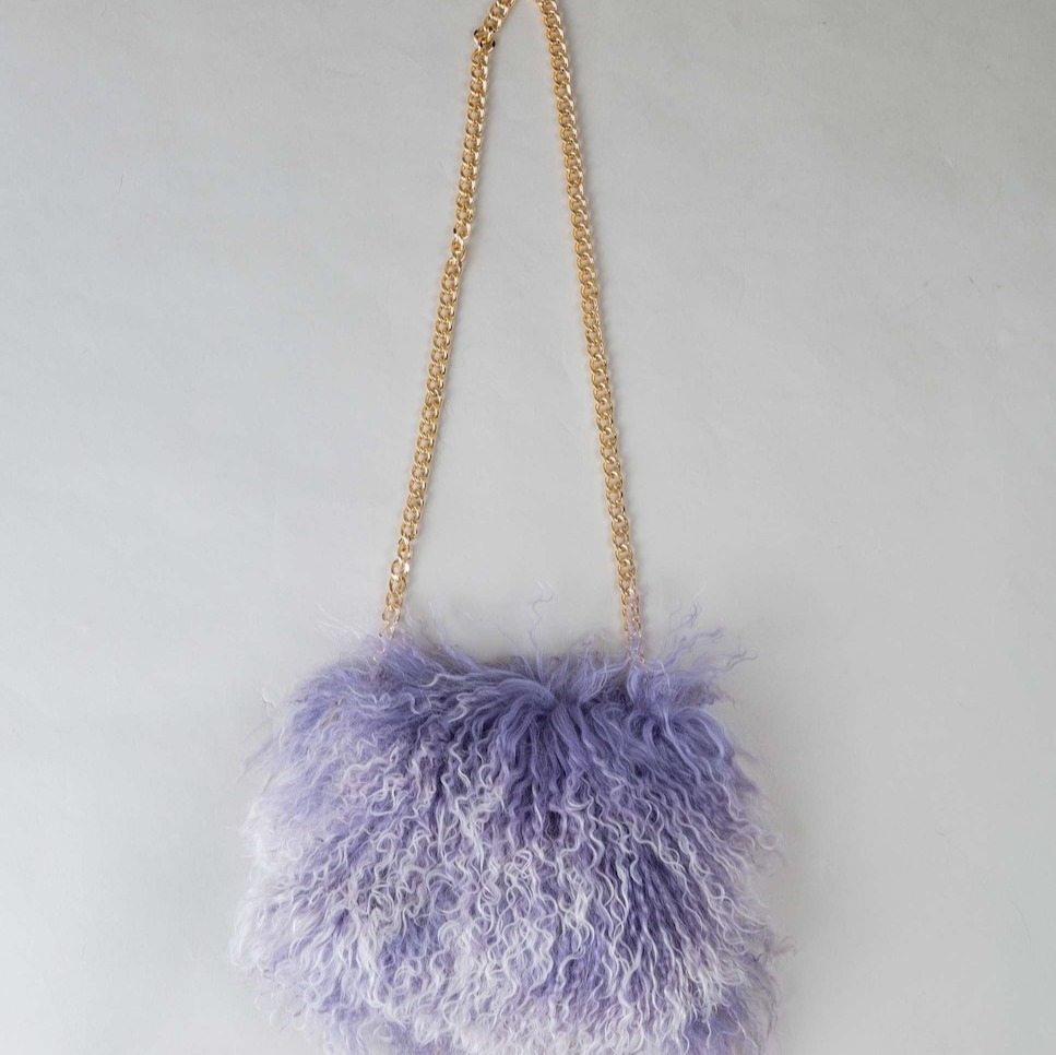 De la Roca
Bolso de multiposición de pelo de cordero del tibet