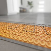 Olvídate de obras y radiadores. Esta es la solución poco conocida que calienta tu piso y puedes usarla donde quieras