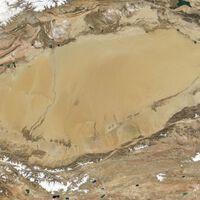 Por miles de años los humanos evitamos cruzar el desierto de Taklamakán. Ahora China está criando pescado allí