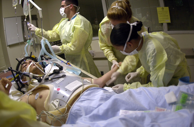 Us Navy 040723 N 8977l 008 Navy Hospital Corpsmen And Medical Officers Assess The Treatment And Prognosis Of A Patient With A Gunshot Wound