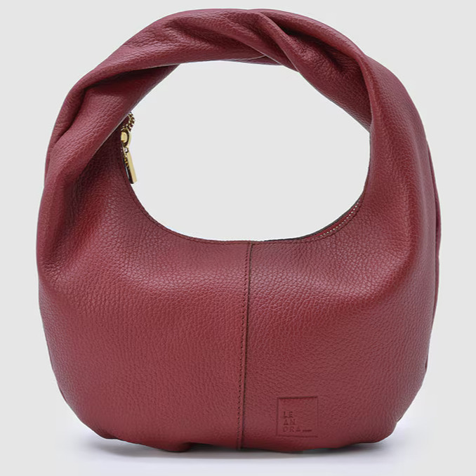 Leandra
Bolso hobo mini de mano de piel vacuna grano con cremallera