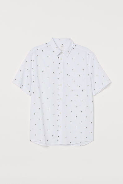 Camisa estampada en mezcla de lino y algodón con cuello inglés, tapeta clásica y un bolsillo superior abierto. Modelo de manga corta con canesú en la espalda y bajo redondeado. Corte estándar – ajuste clásico con cintura ligeramente entallada para una buena libertad de movimientos y una silueta elegante y cómoda.