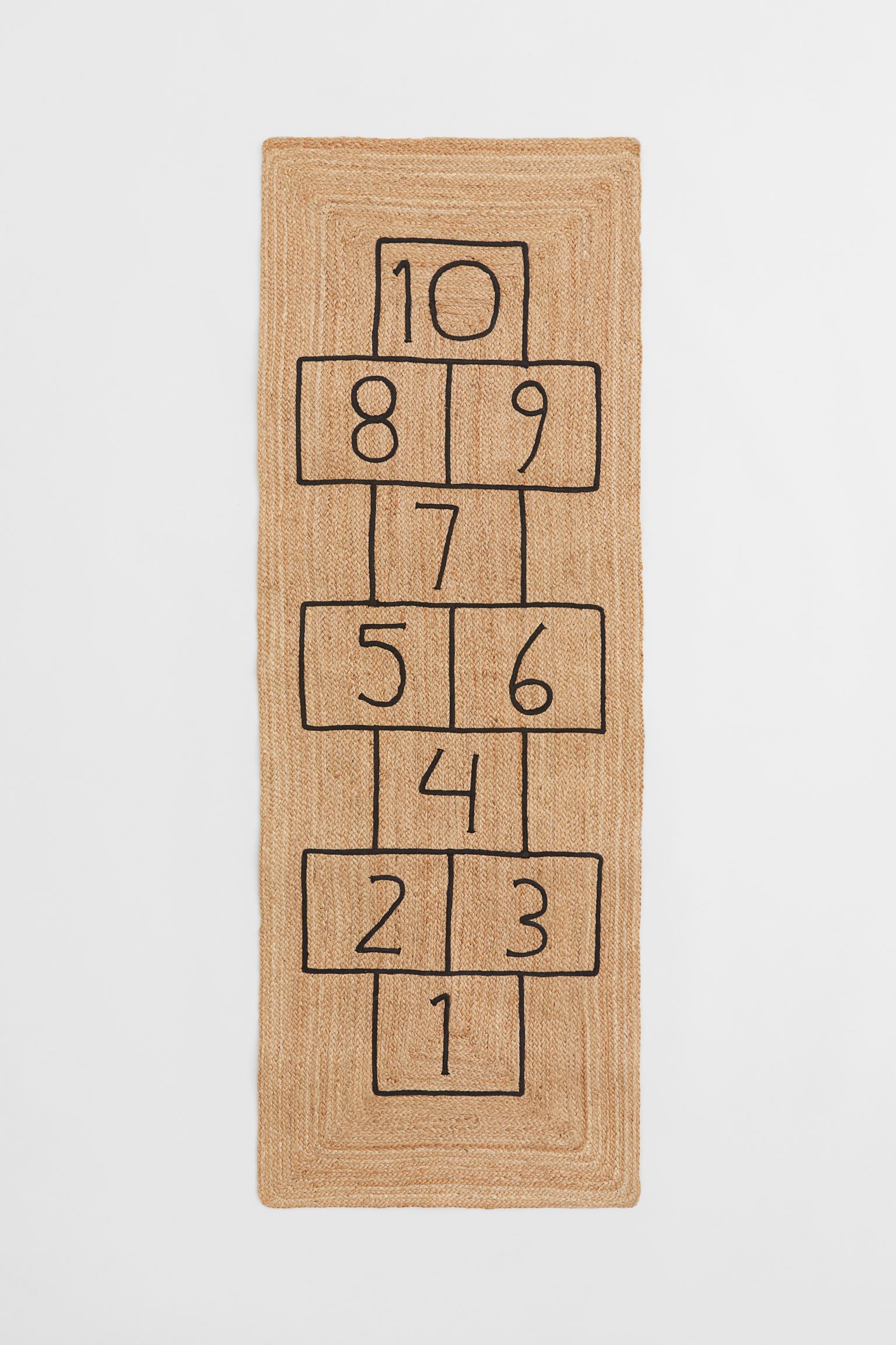 Alfombra trenzada de yute