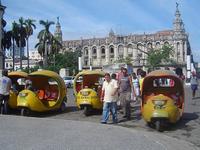 Cuba: viajar en coco taxi