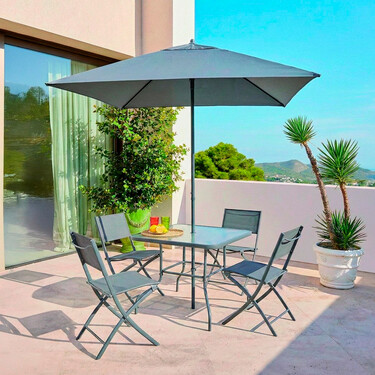 Preparamos nuestra terraza o jardín para cuando desaparezcan las borrascas con este completo conjunto de silla, mesa y sombrilla 