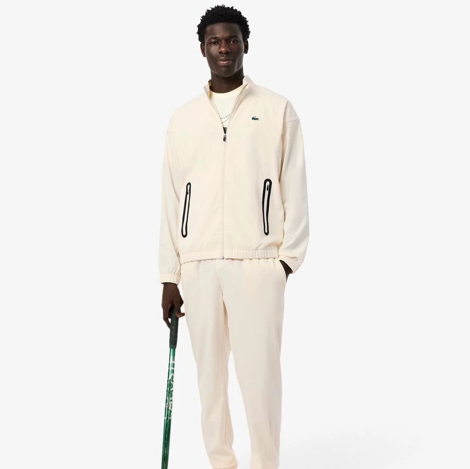 Chándal de hombre de tenis de tafetán en blanco en blanco

