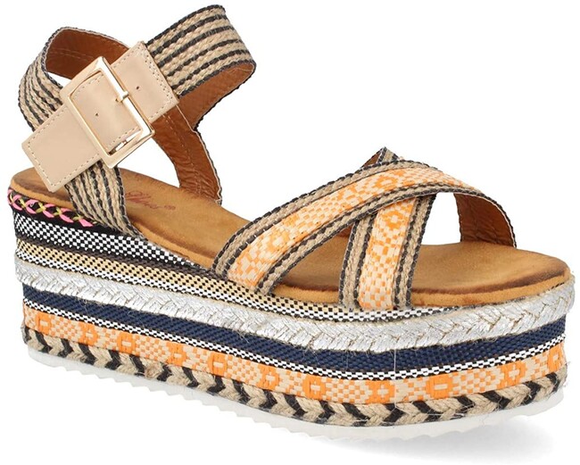 Estas sandalias con plataforma son perfectas para sumar centímetros sin