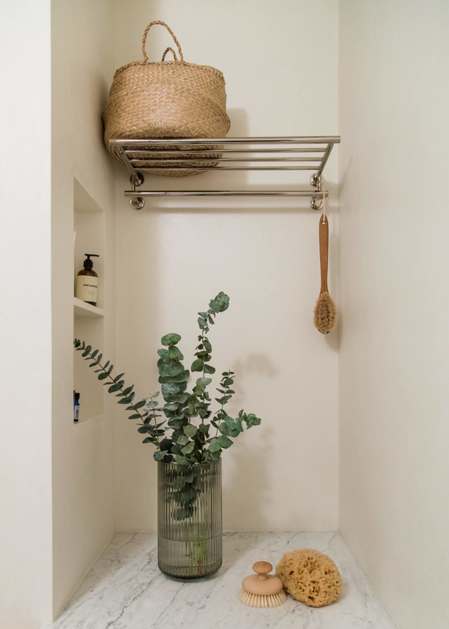 Antes y después de la reforma de un baño en Brooklyn