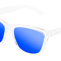 Puedes tener unas gafas de sol Hawkers por sólo 20 euros. Montura transparente y lente azul cobalto