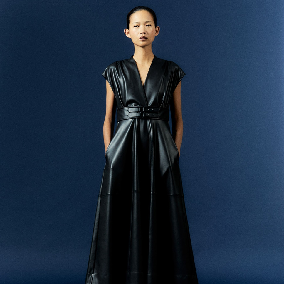 Sfera - Vestido trabillas cintura.