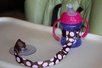 Cinta anticaídas para el biberón