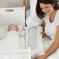 SnüzPod: cuna para colecho que se adosa a la cama de los padres