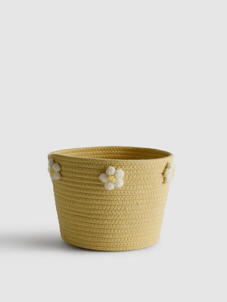 Cesta trenzada para las mantitas del sofá de Primark