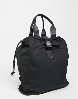 Mochila negra con cordones ajustables en contraste de ASOS DESIGN