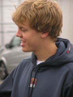 Sebastian Vettel por delante de Nick Heidfeld
