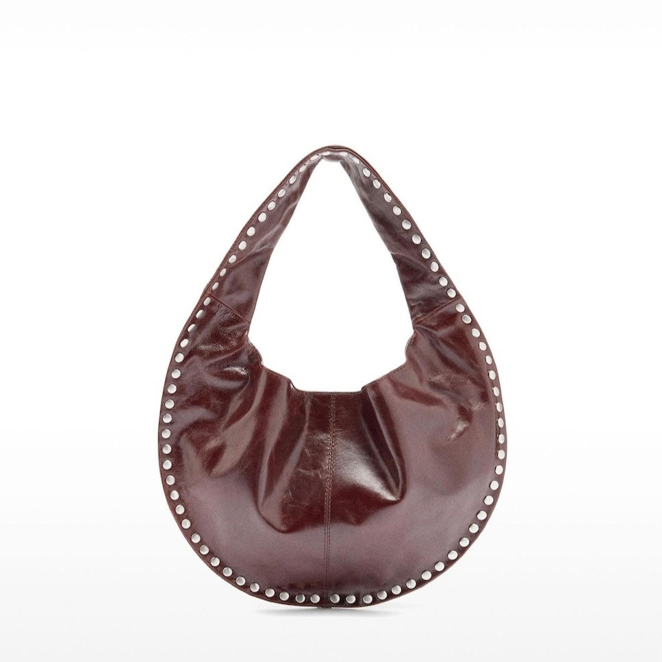 Parfois
Bolso de hombro de piel estilo hobo con tachuelas y cierre imantado en liso