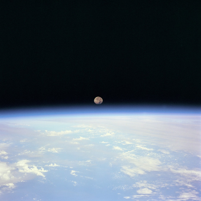 Moon Set Over The Earth Limb Taken From Space Shuttle Discovery During Sts 70 Mission