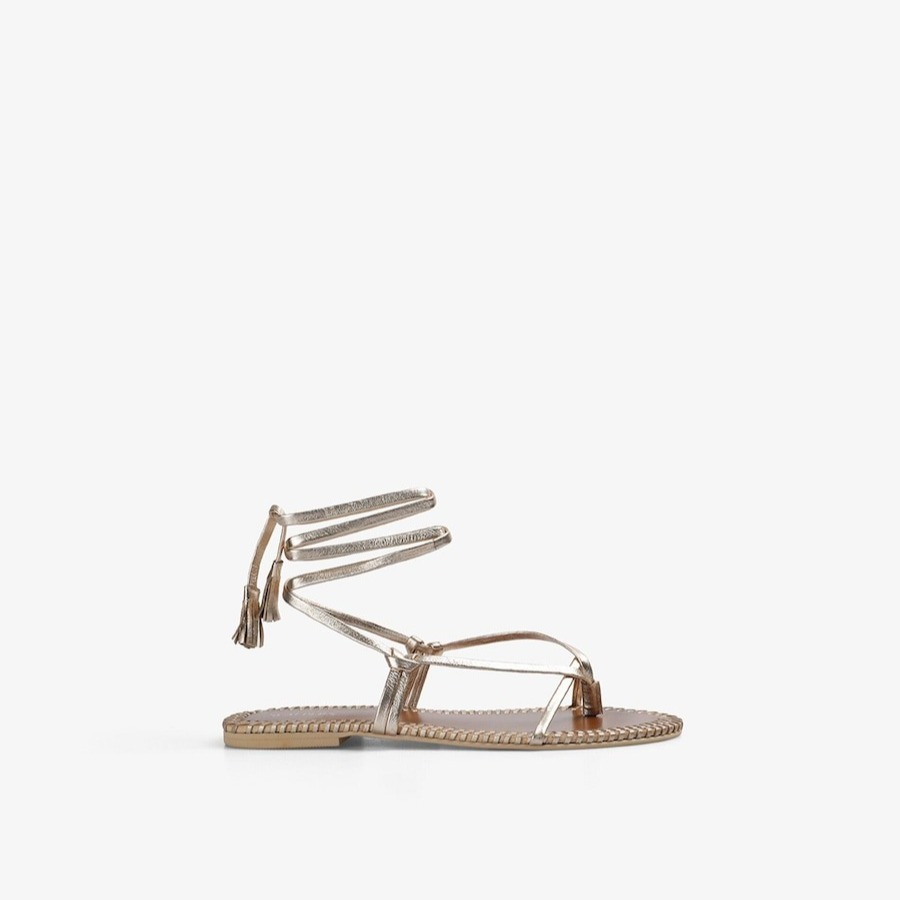 Sandalias de dedo de mujer planas de piel con acabado metalizado Oro Scalpers

