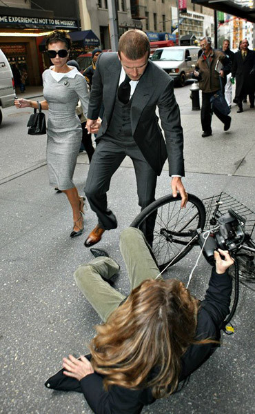 Los fotografos a los pies de los Beckham