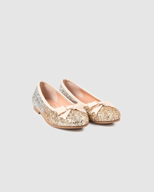 TIZZAS
BAILARINAS DE NIÑA TIZZAS EN COLOR BLANCO CON DETALLE GLITTER