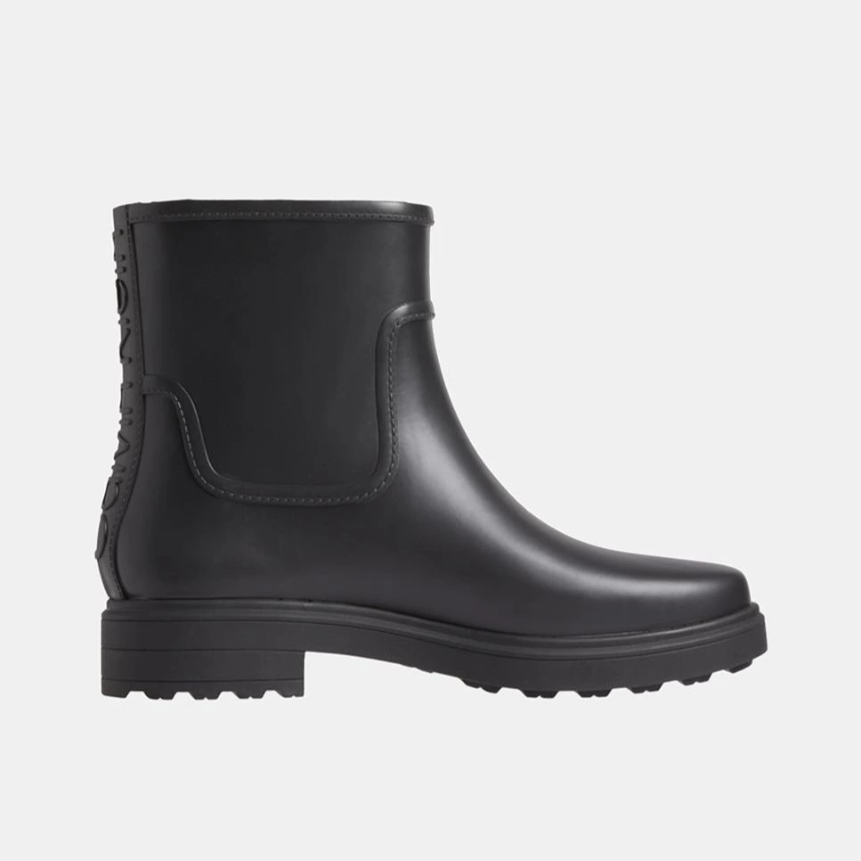 Botas de agua de mujer en negro lisas con logo en relieve y suela al tono
