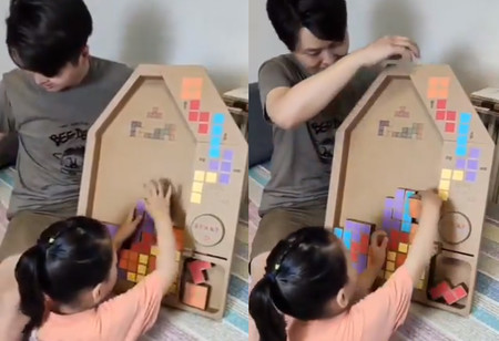 La divertida idea de un padre: crear un Tetris de cartón para que su hija juegue