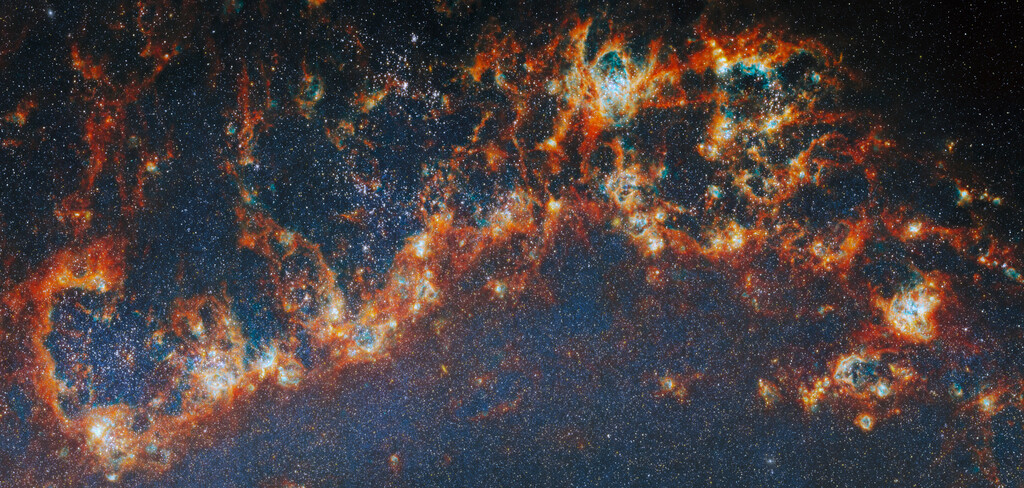 El James Webb ha logrado levantar el "velo" de gas galáctico: así es como las estrellas en nacimiento moldean el destino de sus vecinas