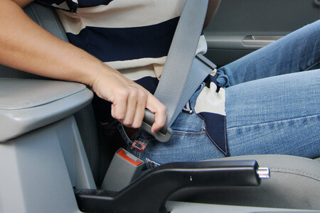 Female Driver Buckling Seatbelt