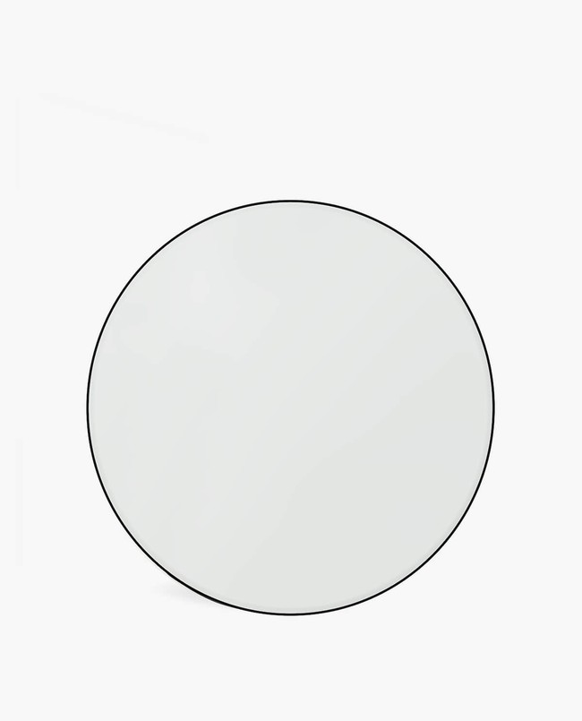 Espejos de lavabo redondos, biselados y pequeños que son tendencia en