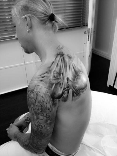 Guti, para mí que se te ha ido de las manos ese tatuaje