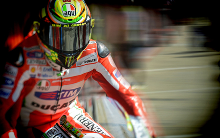 MotoGP Gran Bretaña 2012: con agua, Valentino Rossi, sin agua, Casey Stoner