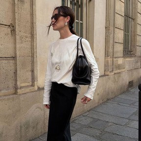 Las faldas midi negras de Stradivarius elegantes y versátiles que llevaremos con zapatos de tacón o con botas en octubre 2026 