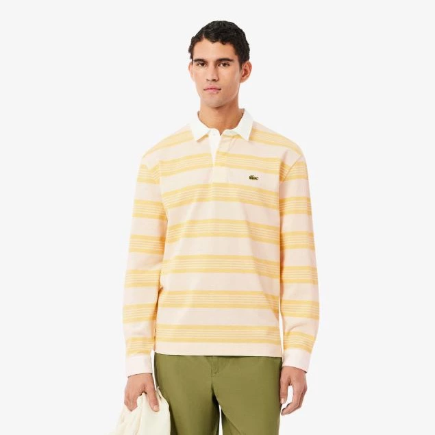 Polo de rugby de piqué de rayas de corte holgado.


