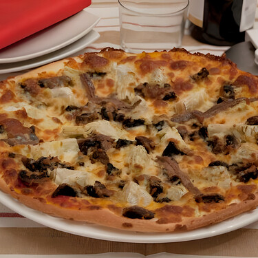 Receta de pizza caprichosa, un clásico italiano que siempre triunfa