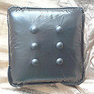 Cojín masajeador para dolores lumbares