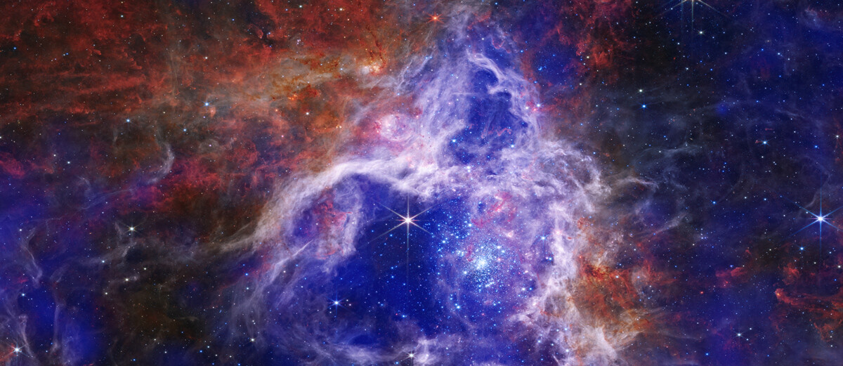 El James Webb aprovecha los rayos X del observatorio Chandra para tener una nueva y espectacular vista de la Nebulosa de la Tarántula