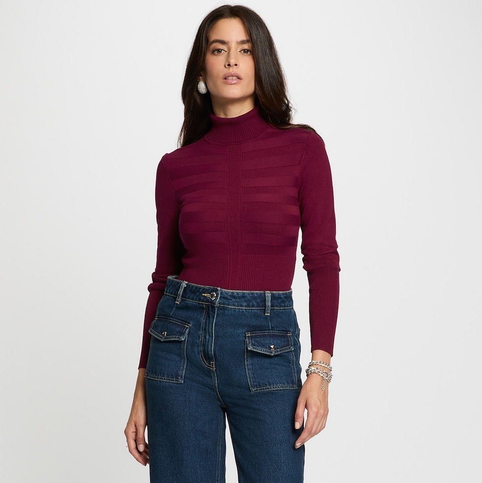 Morgan
Jersey de mujer de cuello alto ajustado