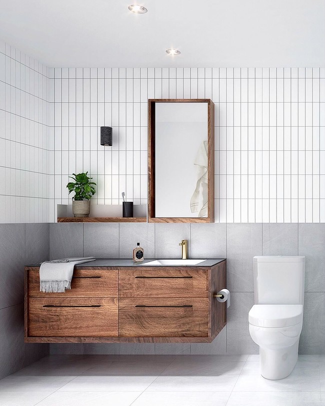 Tendencia en el baño; los azulejos también se colocan en vertical en