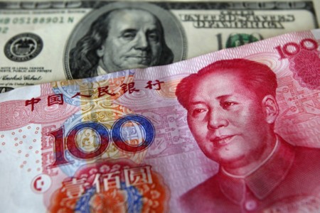 FMI da luz verde para incorporar al yuan chino en su canasta de monedas