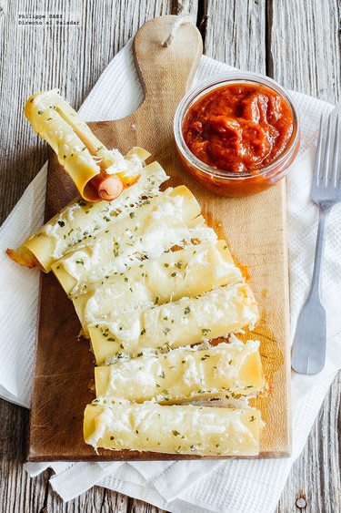 Canelones con salchicha y queso. Receta de botana