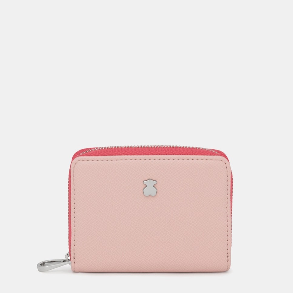 Tous
Monedero mediano con cierre de cremallera.