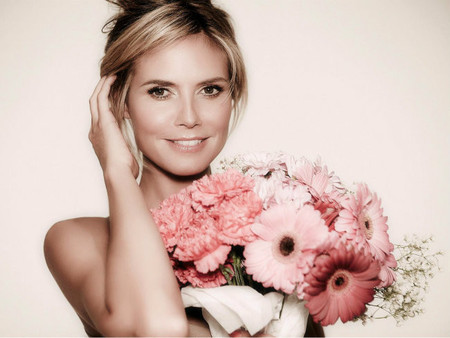 Heidi Klum cuelga el sujetador y las alas
