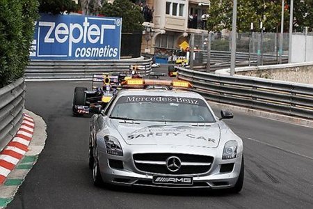 Bernd Mäylander por delante del podio de Mónaco (Webber, Vettel, Kubica) hasta la última curva